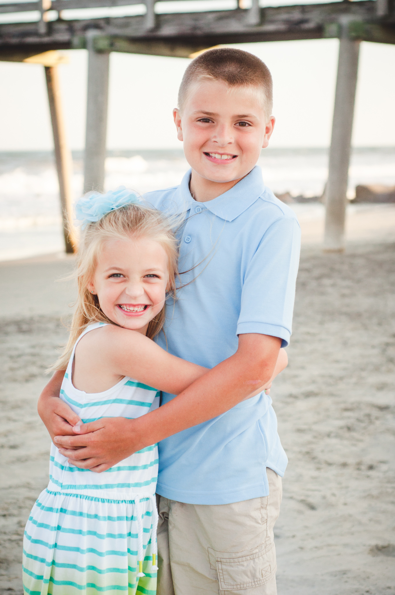 sibling love on beach portraits