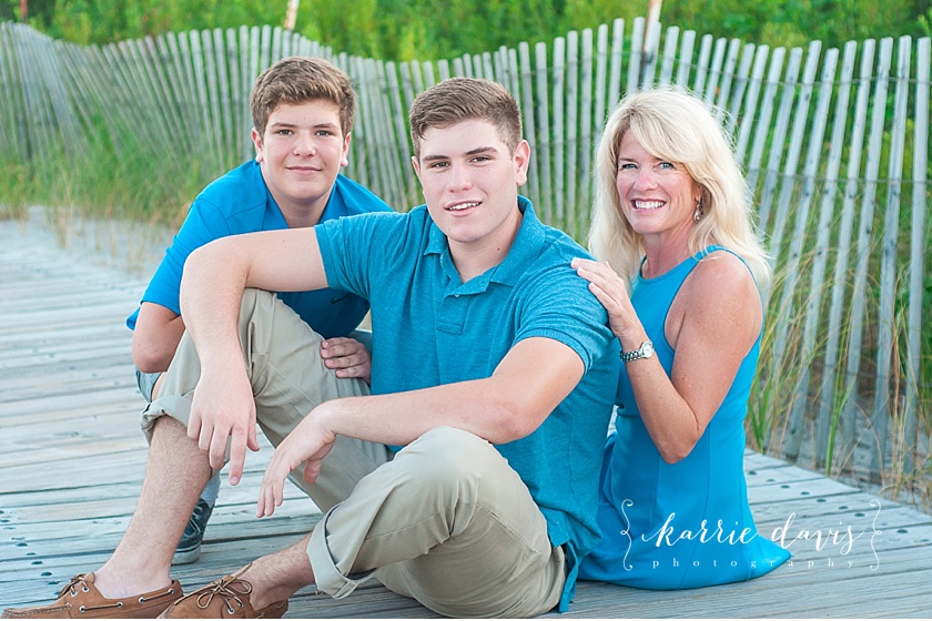 unique pose idea of mom with older boys