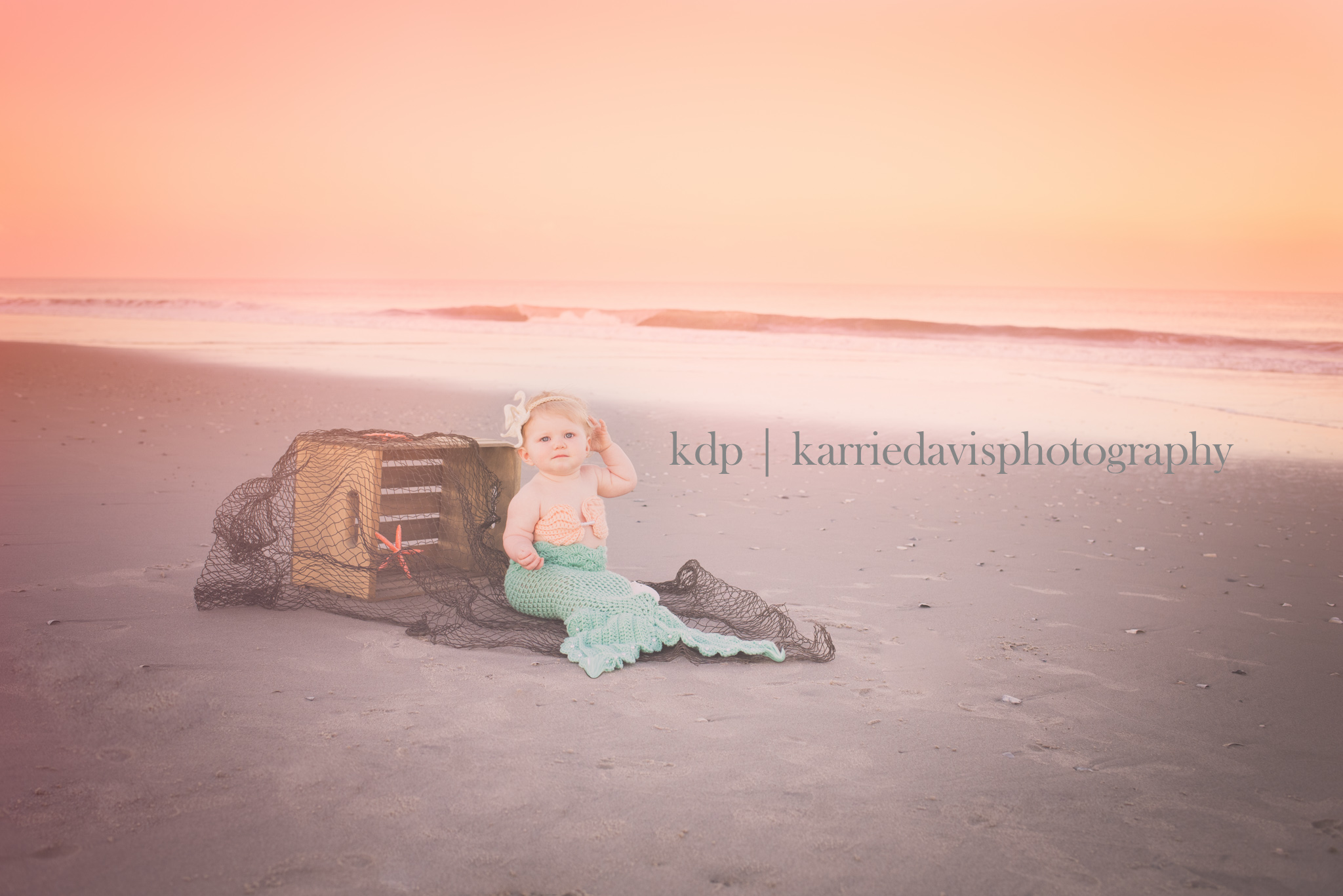 mermaid photography on the beach. Loved this mermaid outfit for this infant and the seashell bikinis too.