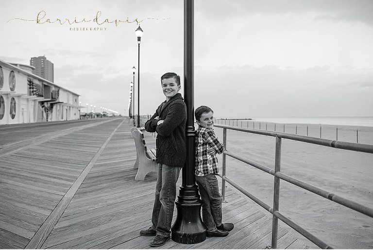 Black and white photo of two brothers at Belmar Beach in NJ.