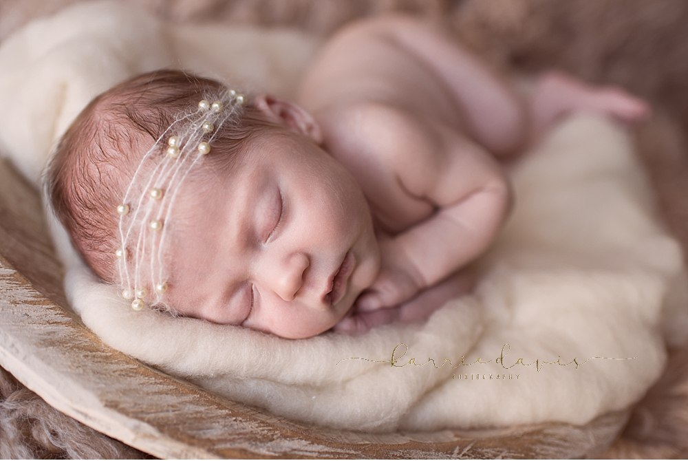 South Jersey newborn photographer captures this beautiful baby girl. love the newborn posing